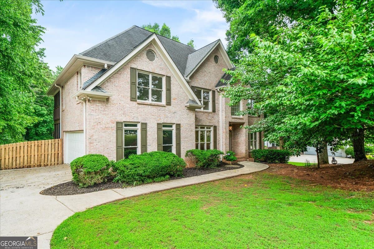 4 bedroom, 4.5 bathroom, 3,964 sq ft single family residence sold at 1710 Rising Mist Lane, Cumming, GA 30041