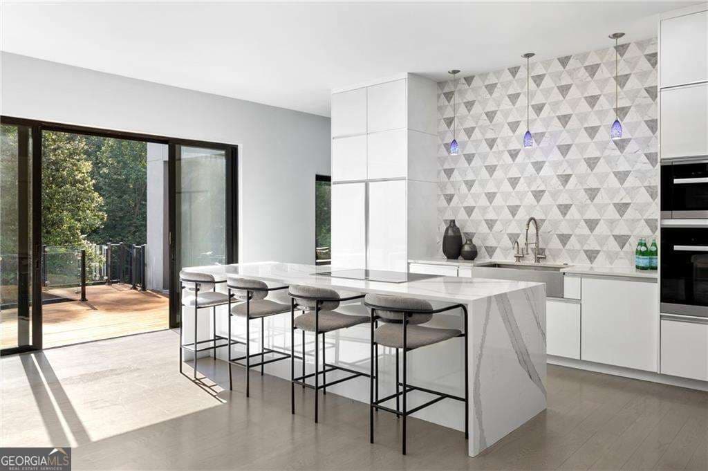 6 bedroom, 6.5 bathroom, 6,400 sq ft single family residence for sale at 4036 Statewood Road, Atlanta, GA 30342 — photo 5