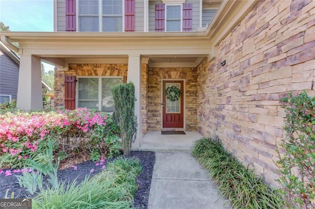 4 bedroom, 3 bathroom, 2,255 sq ft single family residence for sale at 7772 Copper Kettle Way, Flowery Branch, GA 30542 — photo 4