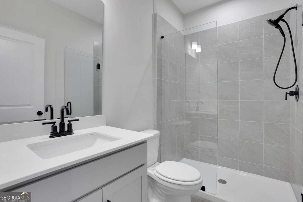 5 bedroom, 4 bathroom, 3,313 sq ft single family residence for sale at 4232 Adler Circle 50, Buford, GA 30519 — photo 7