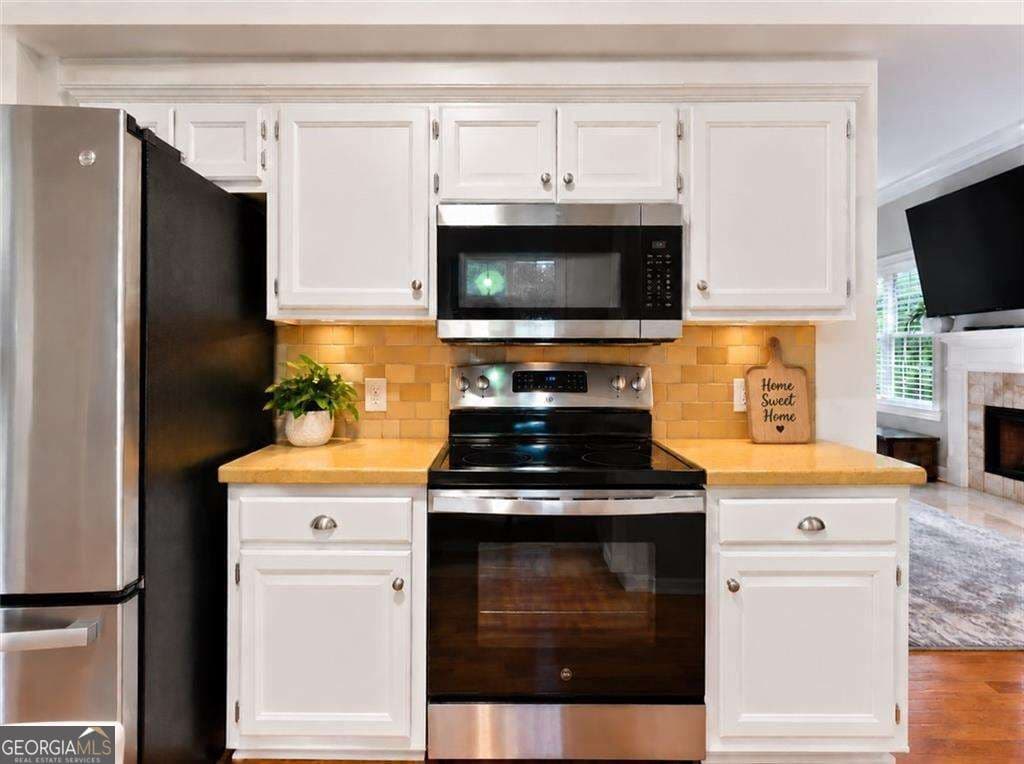 4 bedroom, 3 bathroom single family residence for sale at 4155 Gables Place, Buford, GA 30519 — photo 10