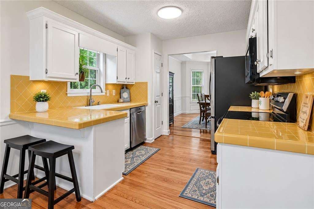4 bedroom, 3 bathroom single family residence for sale at 4155 Gables Place, Buford, GA 30519 — photo 8