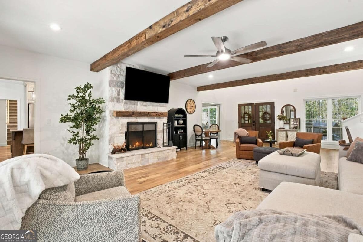 6 bedroom, 5.5 bathroom single family residence for sale at 4887 Bill Cheek Road, Auburn, GA 30011 — photo 2