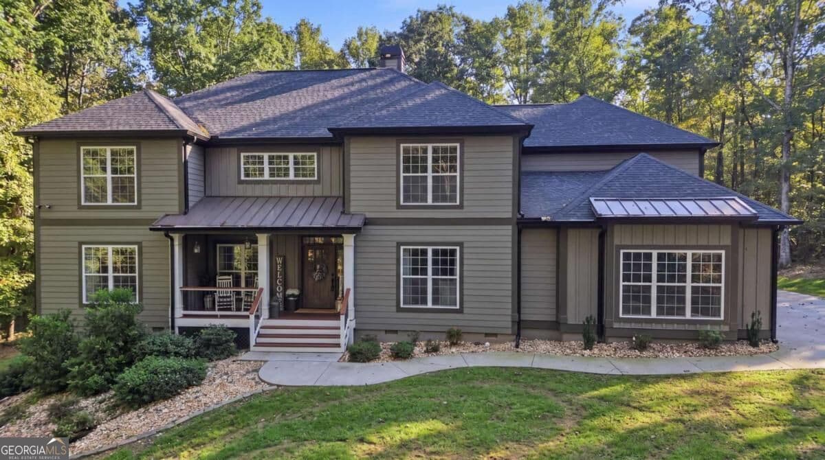 6 bedroom, 5.5 bathroom single family residence for sale at 4887 Bill Cheek Road, Auburn, GA 30011