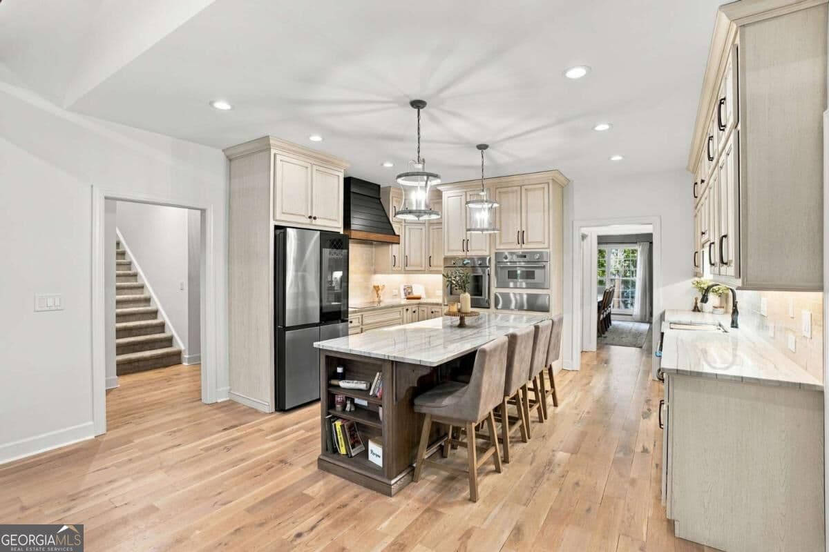 6 bedroom, 5.5 bathroom single family residence for sale at 4887 Bill Cheek Road, Auburn, GA 30011 — photo 4