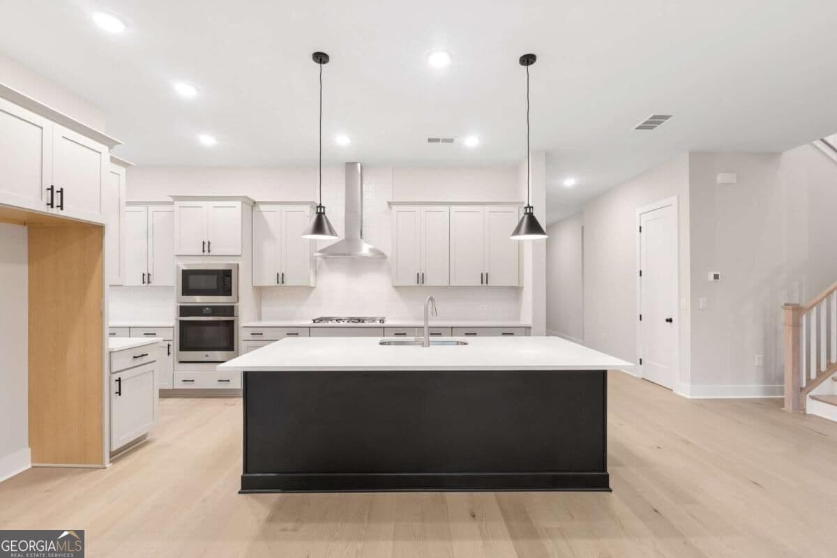 5 bedroom, 4.5 bathroom, 3,417 sq ft single family residence for sale at 4665 Beechnut Circle, Cumming, GA 30028 — photo 7