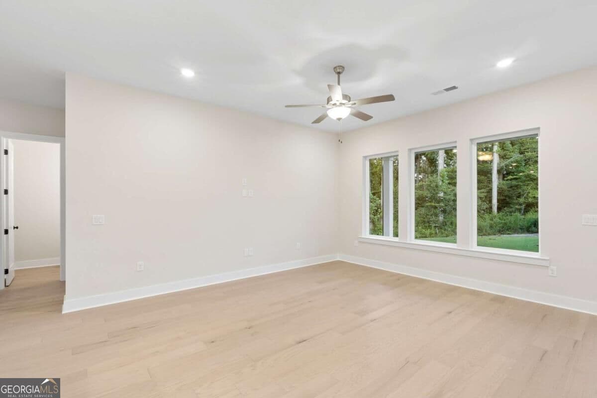 5 bedroom, 4.5 bathroom, 3,417 sq ft single family residence for sale at 4665 Beechnut Circle, Cumming, GA 30028 — photo 9