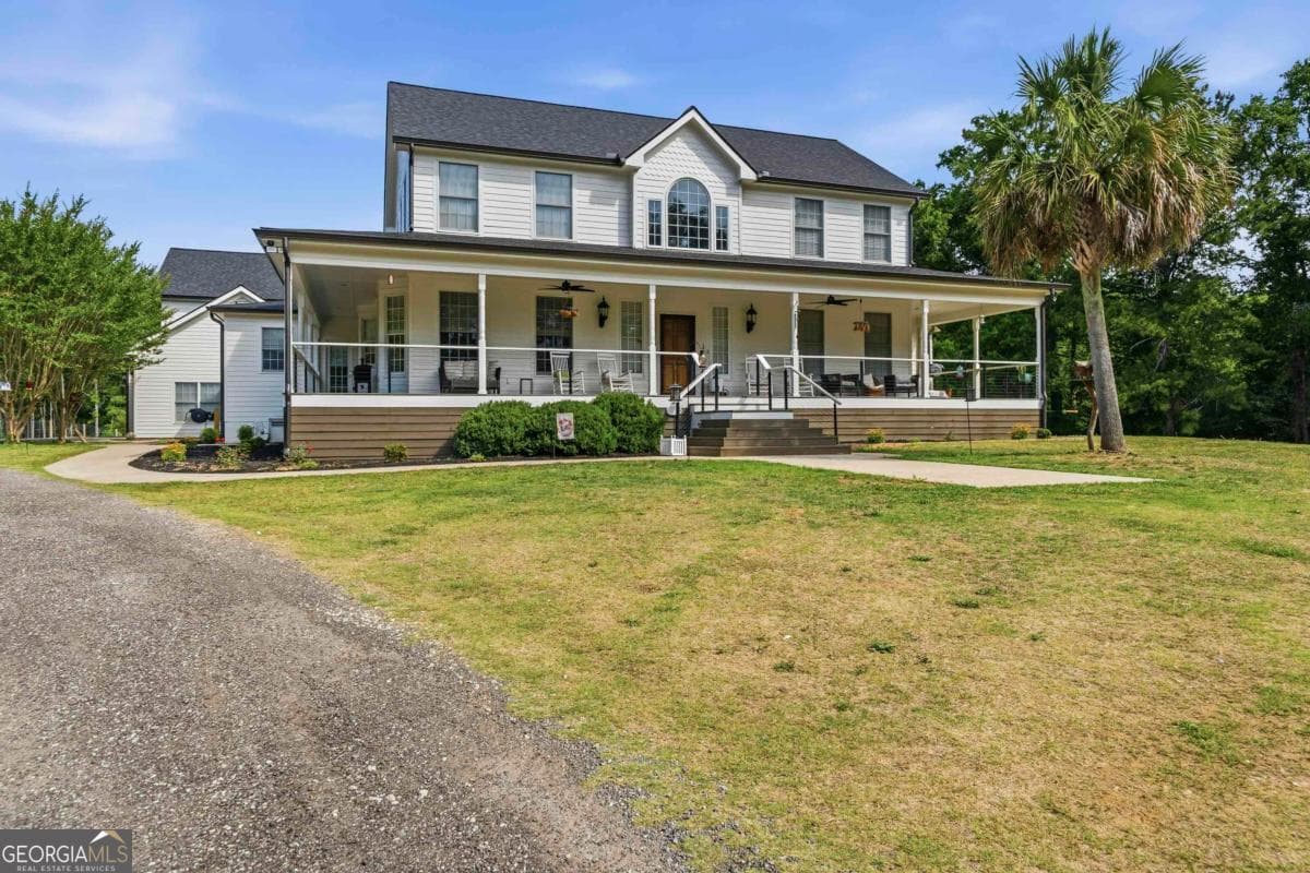7 bedroom, 7.5 bathroom, 6,194 sq ft single family residence for sale at 1361 West Broad Street, Greensboro, GA 30642 — photo 2