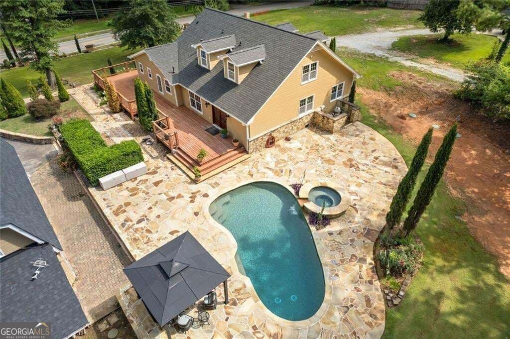 6 bedroom, 4 bathroom, 2,892 sq ft single family residence for sale at 335 Level Creek Road, Sugar Hill, GA 30518 — photo 2