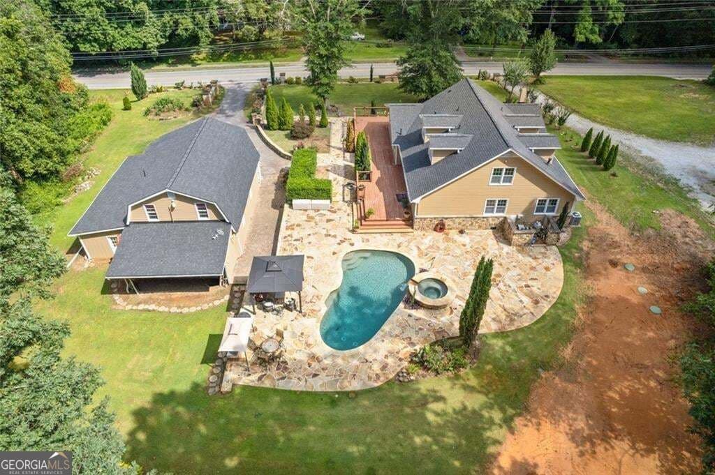 6 bedroom, 4 bathroom, 2,892 sq ft single family residence for sale at 335 Level Creek Road, Sugar Hill, GA 30518 — photo 1 of 63
