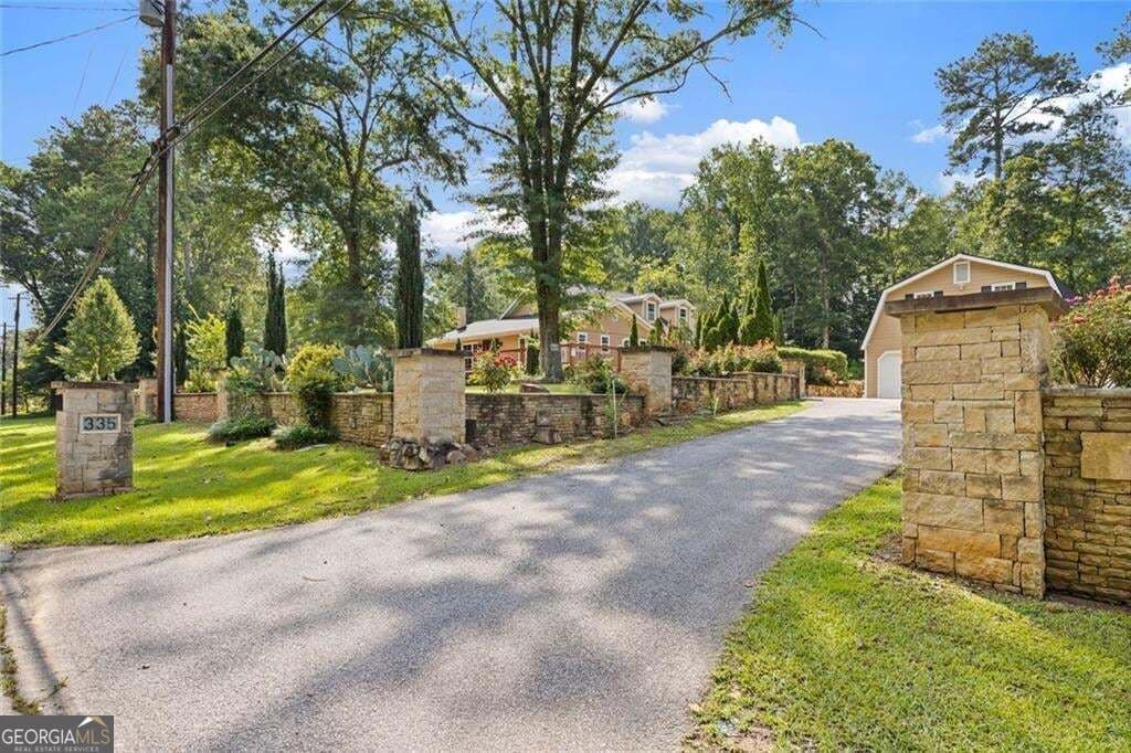 6 bedroom, 4 bathroom, 2,892 sq ft single family residence for sale at 335 Level Creek Road, Sugar Hill, GA 30518 — photo 9