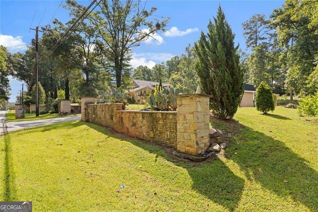 6 bedroom, 4 bathroom, 2,892 sq ft single family residence for sale at 335 Level Creek Road, Sugar Hill, GA 30518 — photo 8