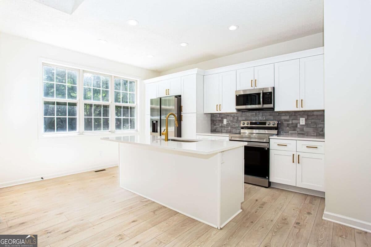 3 bedroom, 2 bathroom, 1,292 sq ft single family residence for sale at 8071 Beachwood Drive, Murrayville, GA 30564 — photo 10