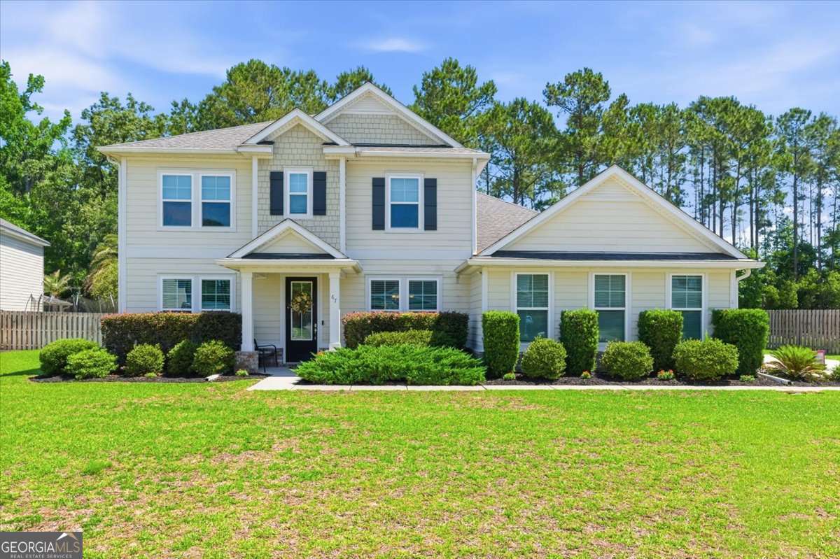 6 bedroom, 3.5 bathroom, 3,935 sq ft single family residence sold at 67 Timberland Circle, Richmond Hill, GA 31324