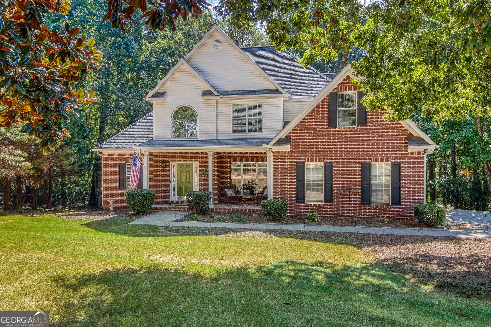5 bedroom, 3 bathroom, 2,409 sq ft single family residence for sale at 15 Grange Way, Sharpsburg, GA 30277 — photo 1 of 56