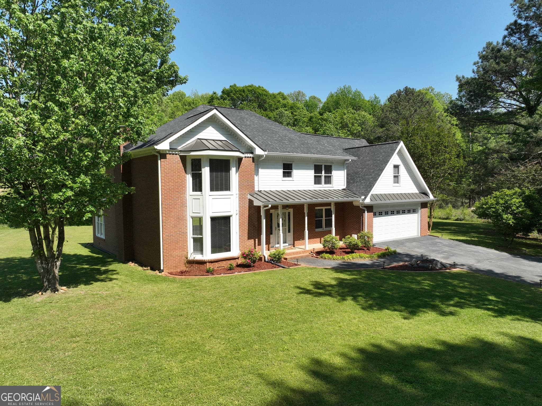 4 bedroom, 3.5 bathroom, 3,746 sq ft single family residence sold at 2156 Fairway Circle, Duluth, GA 30096
