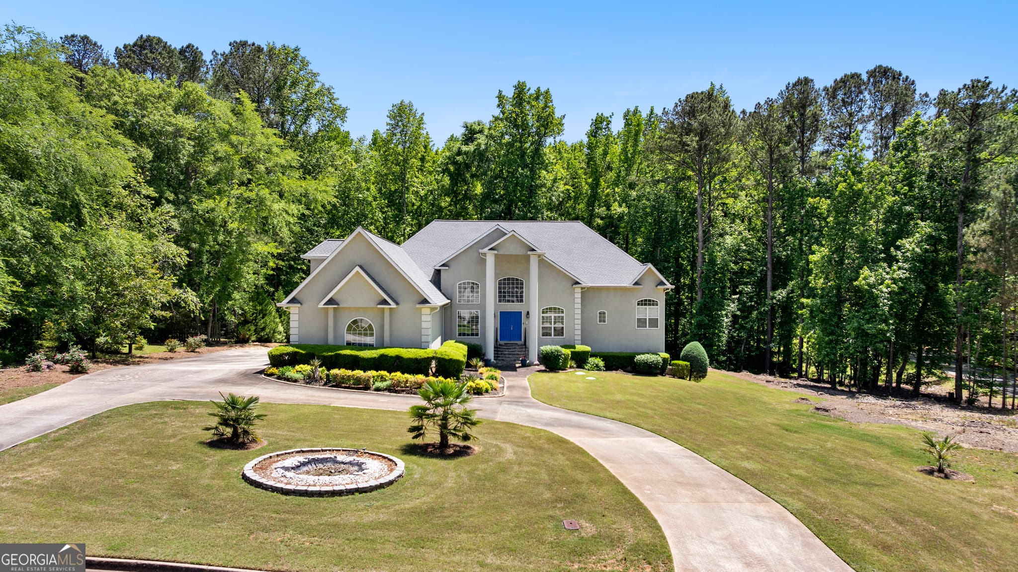 4 bedroom, 3 bathroom, 3,966 sq ft single family residence for sale at 915 Magnolia Way, Hampton, GA 30228