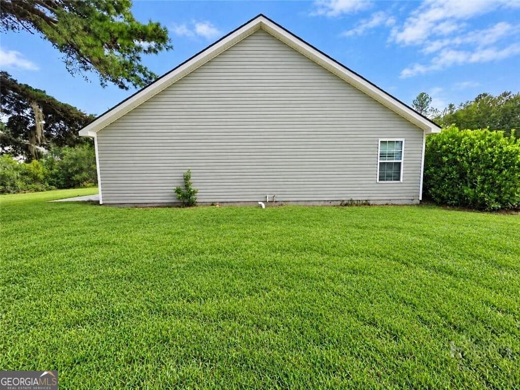3 bedroom, 2 bathroom, 1,215 sq ft single family residence for sale at 214 Archer Road, Guyton, GA 31312 — photo 5