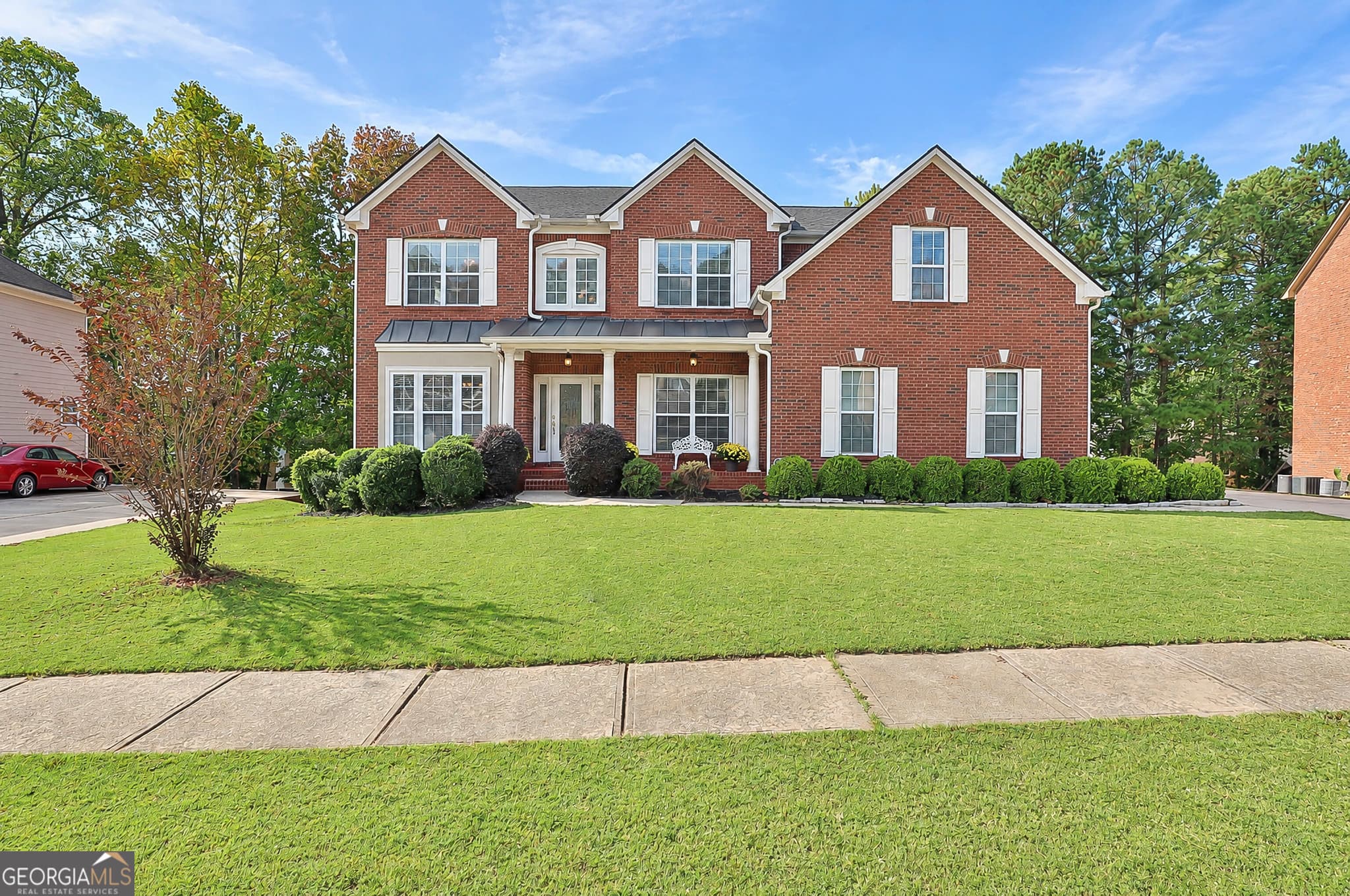 5 bedroom, 4 bathroom, 3,661 sq ft single family residence for sale at 15 Stonebridge Boulevard, Newnan, GA 30265 — photo 2