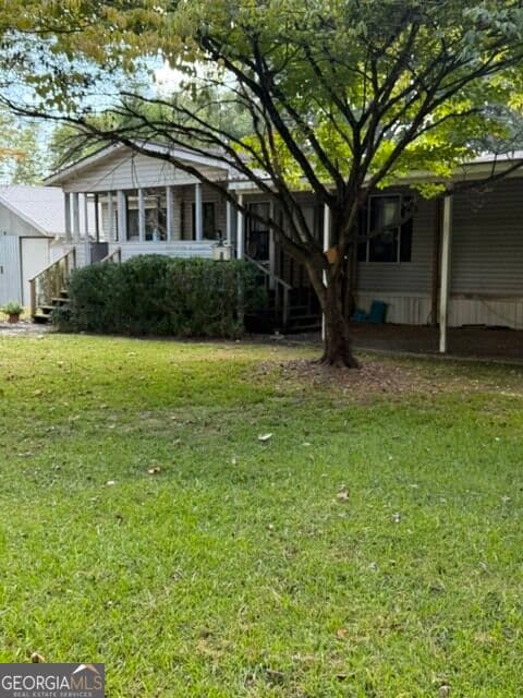 3 bedroom, 2 bathroom, 1,248 sq ft manufactured home,single family residence under contract at 10 Johnson Avenue, Manchester, GA 31816 — photo 2