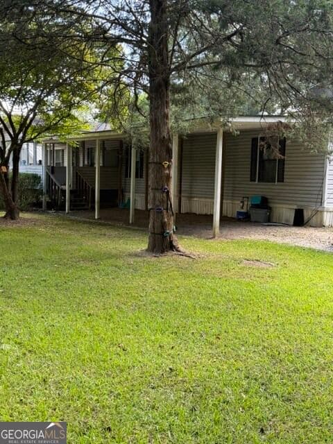 3 bedroom, 2 bathroom, 1,248 sq ft manufactured home,single family residence under contract at 10 Johnson Avenue, Manchester, GA 31816 — photo 3
