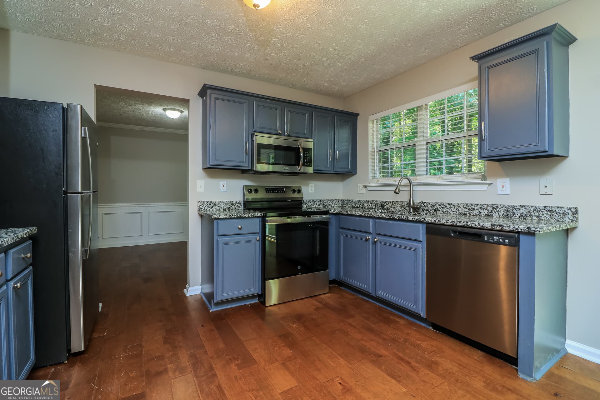 4 bedroom, 2.5 bathroom, 2,286 sq ft single family residence for sale at 3264 Ashgrove Lane, Marietta, GA 30008 — photo 10