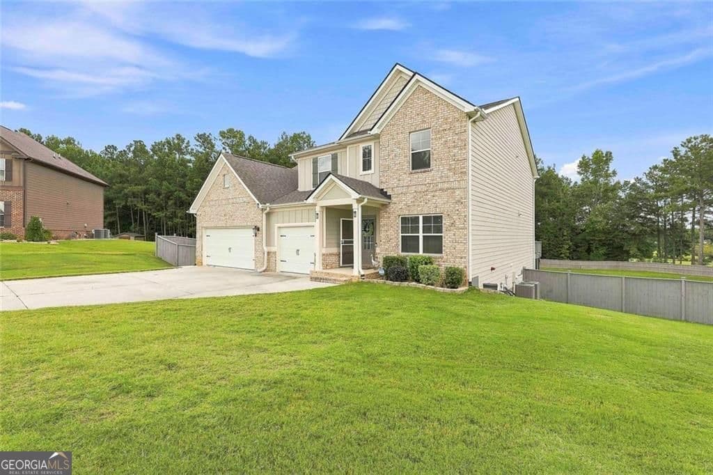 5 bedroom, 4.5 bathroom, 5,183 sq ft single family residence for sale at 155 Estancia Lane, Fayetteville, GA 30215 — photo 3