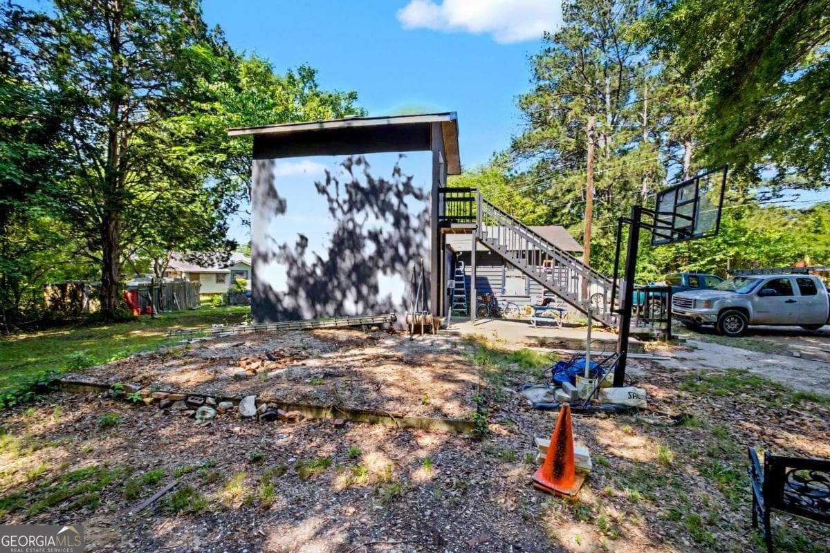 6 bedroom, 1 bathroom, 1,600 sq ft single family residence for sale at 4056 Church Street, Conley, GA 30288 — photo 5