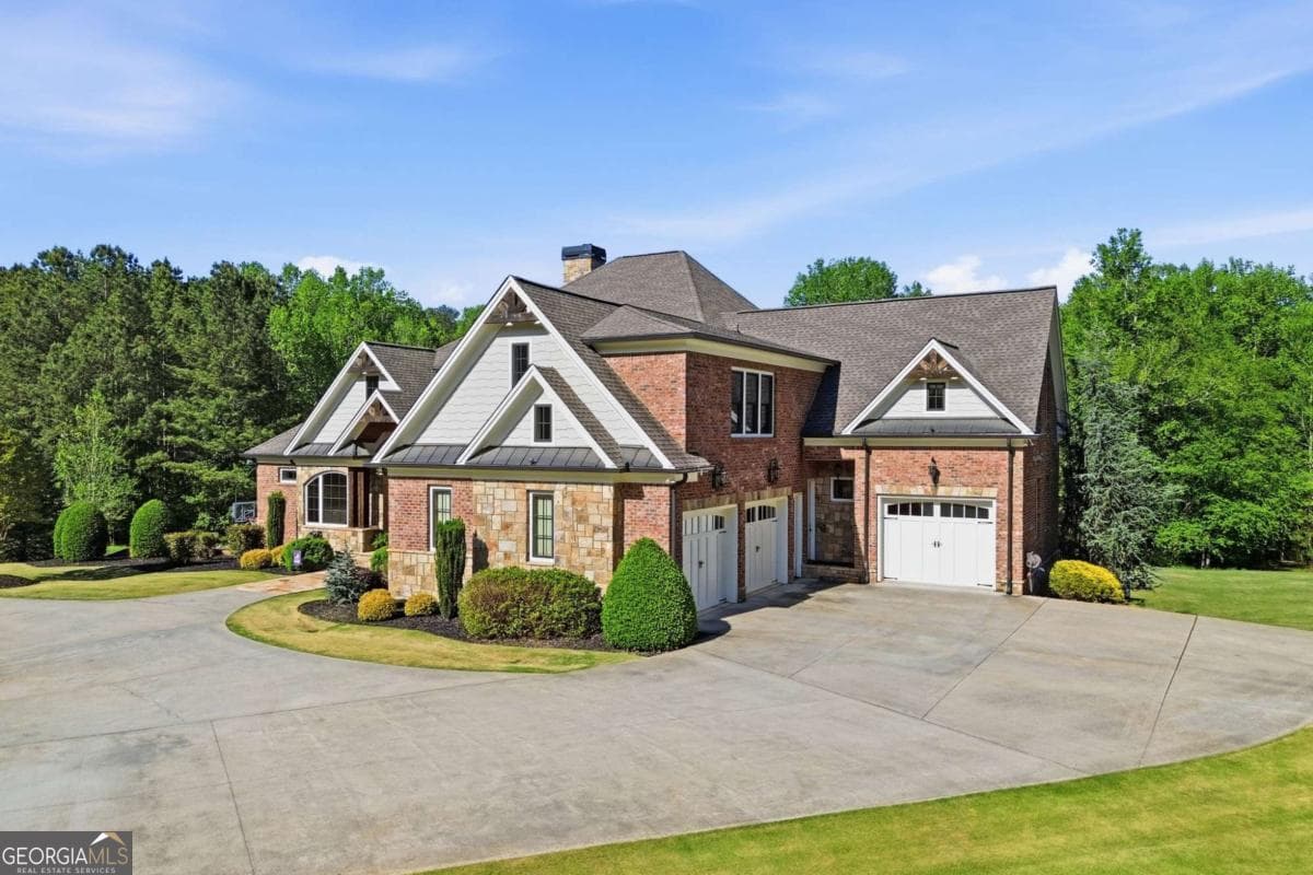 6 bedroom, 7.5 bathroom, 10,863 sq ft single family residence for sale at 680 Gaddis Road, Canton, GA 30115 — photo 2