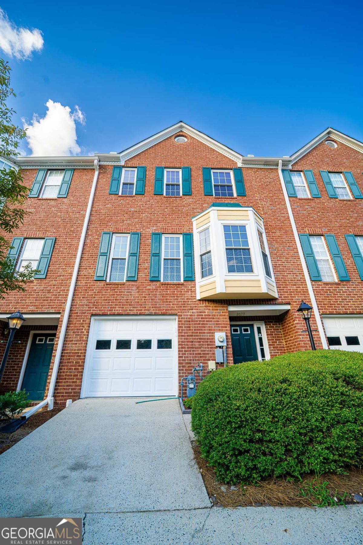 4 bedroom, 3.5 bathroom townhouse for sale at 2077 Pinnacle Pointe Drive, Norcross, GA 30071 — photo 1 of 35