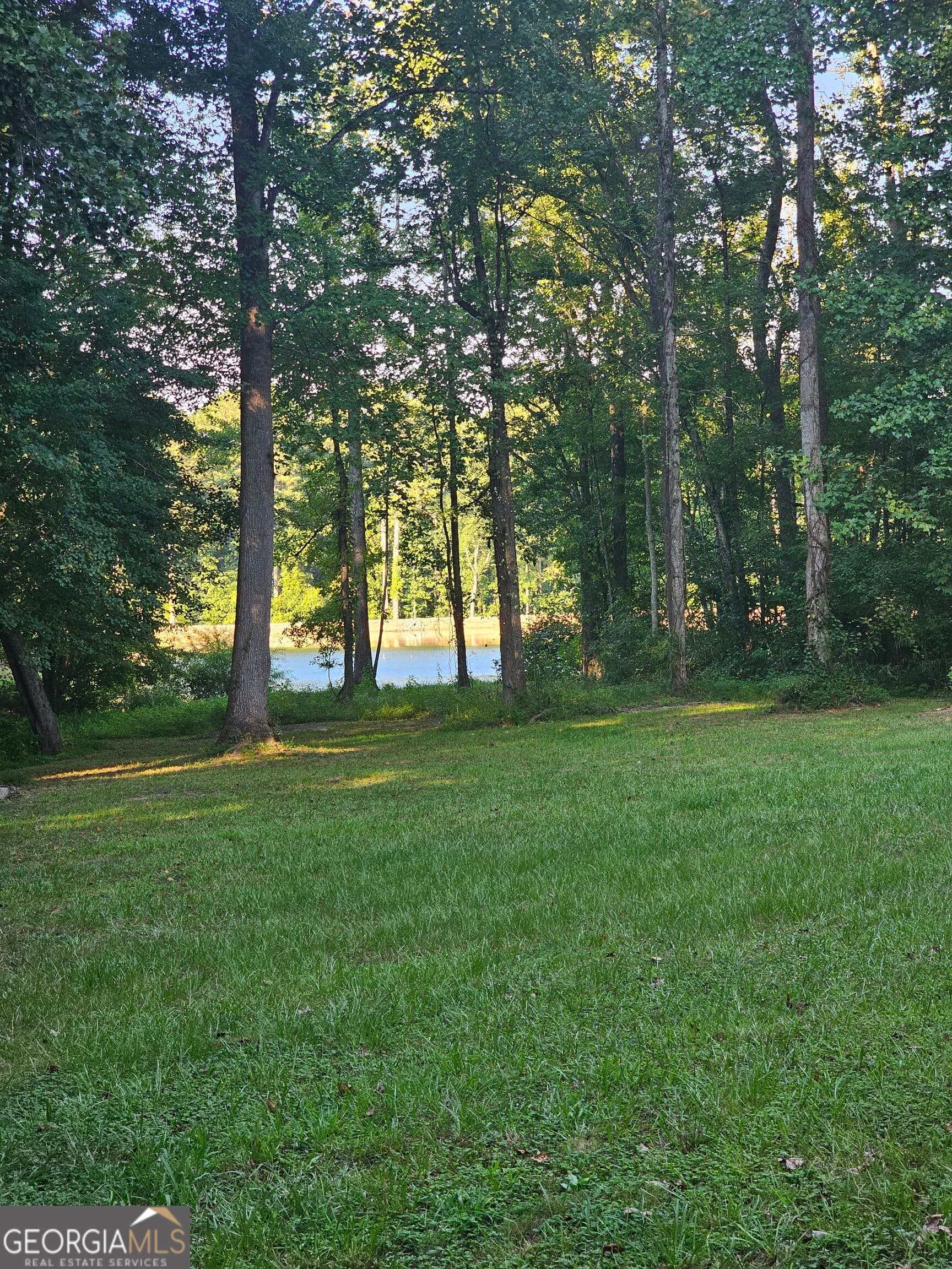 4 bedroom, 3 bathroom, 3,462 sq ft single family residence for sale at 3300 Stewart Lake Road, Monroe, GA 30655 — photo 4