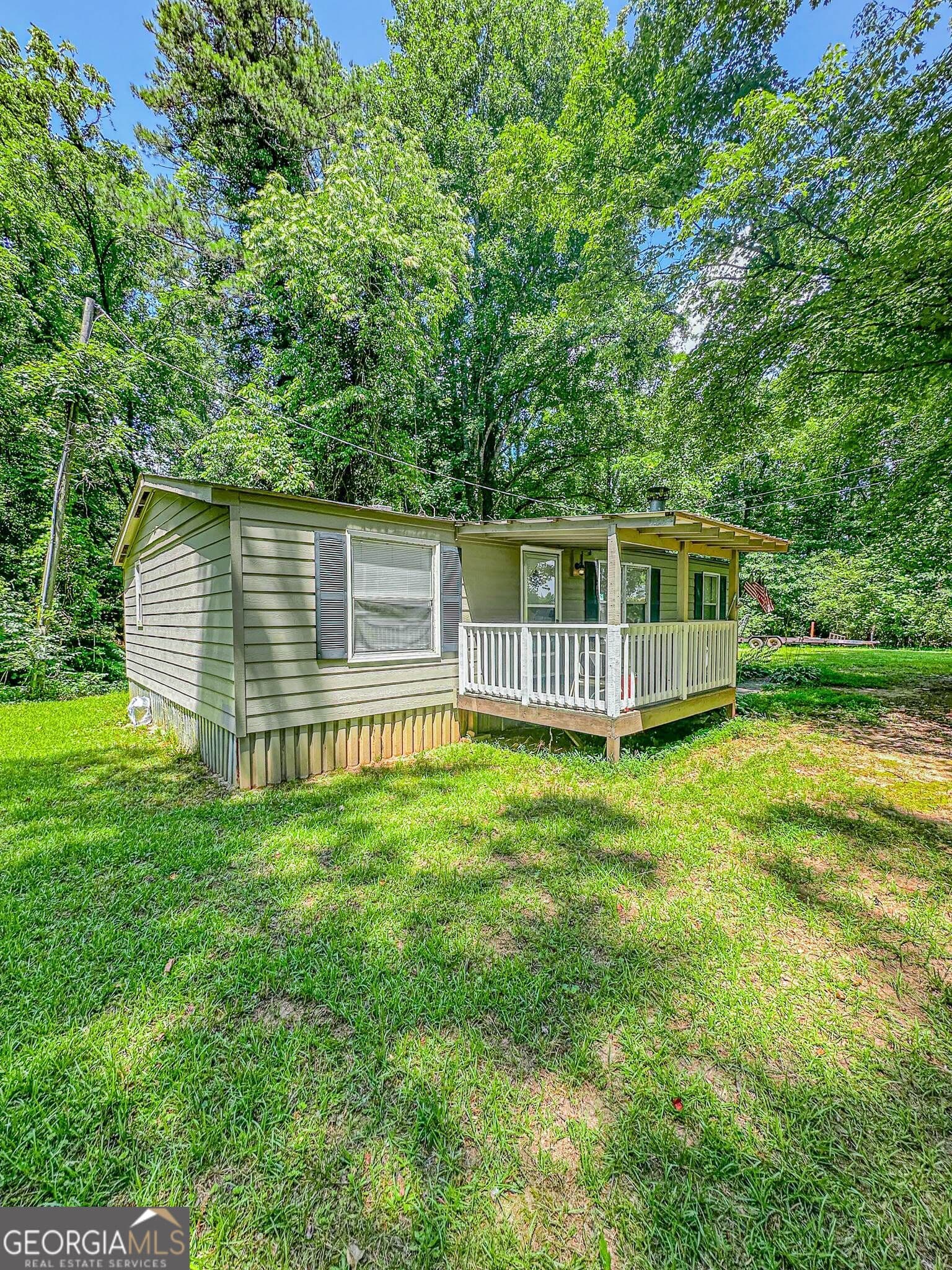 3 bedroom, 2 bathroom, 1,040 sq ft manufactured home,single family residence for rent at 6220 Town Creek Road, Dahlonega, GA 30533 for $1,425 a month — photo 2