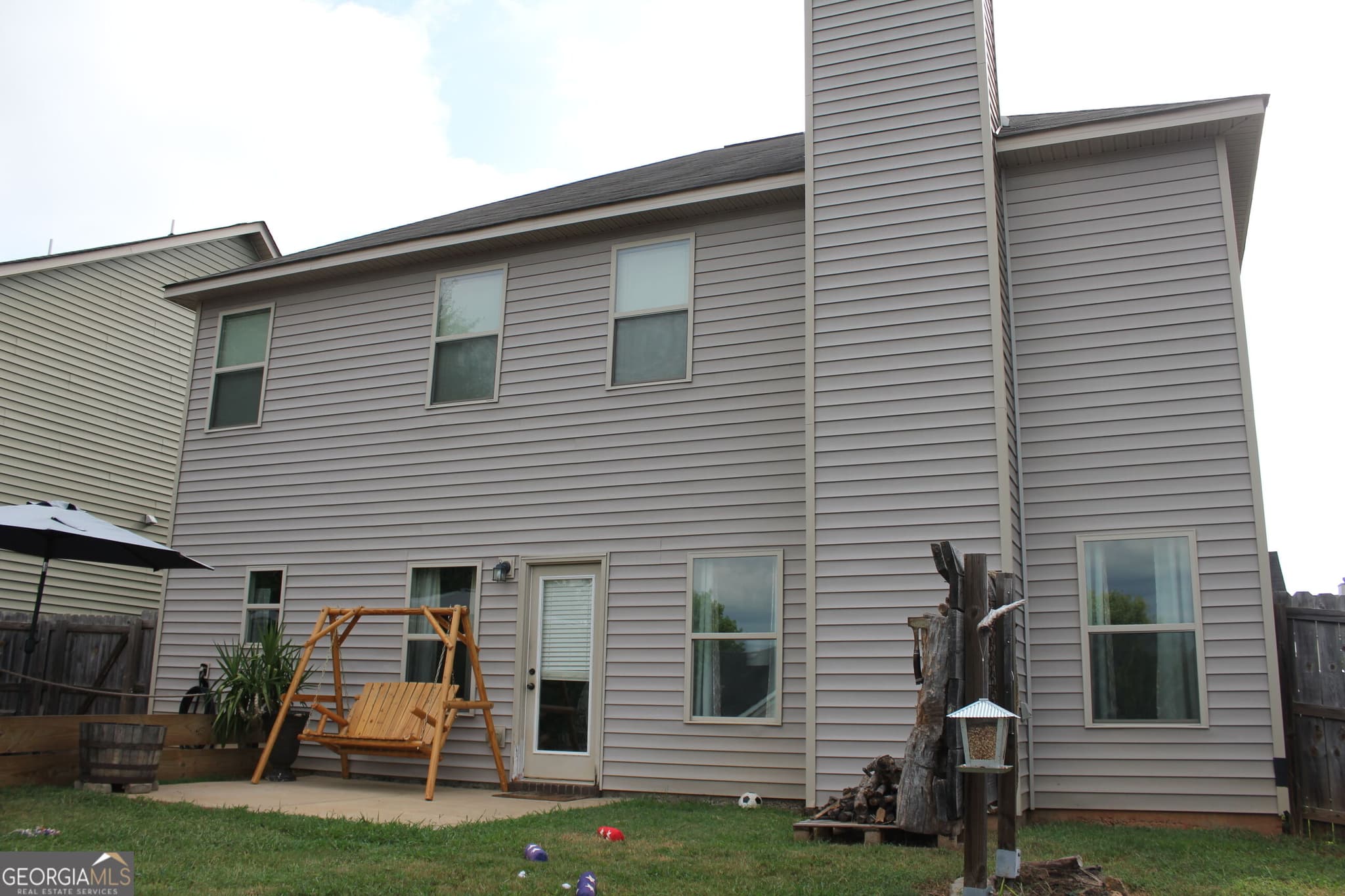 4 bedroom, 2.5 bathroom, 2,177 sq ft single family residence for sale at 169 Madison Avenue, Jackson, GA 30233 — photo 4