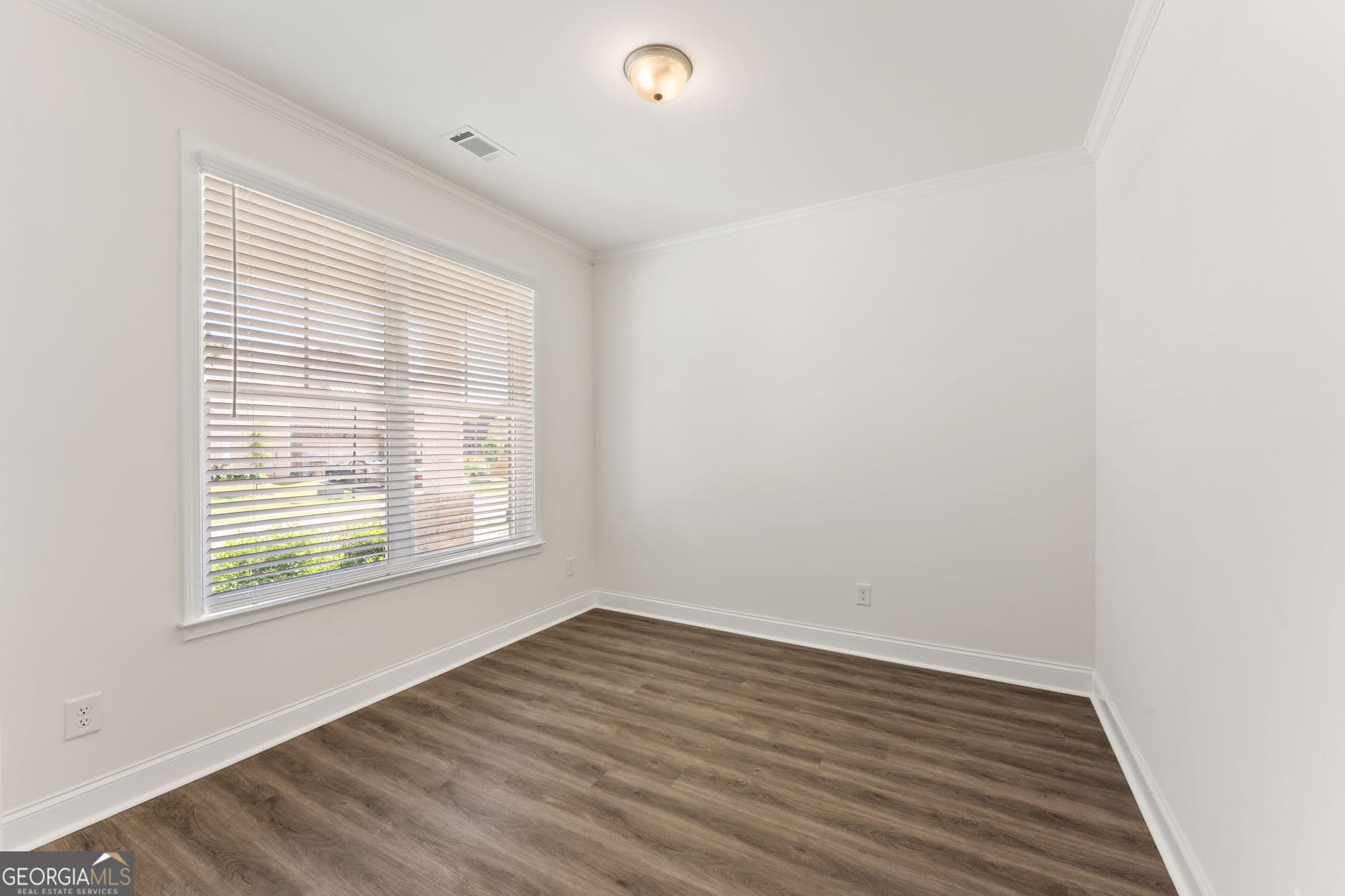 4 bedroom, 2.5 bathroom, 2,428 sq ft single family residence for sale at 3976 Lockaby Way, Lawrenceville, GA 30044 — photo 3