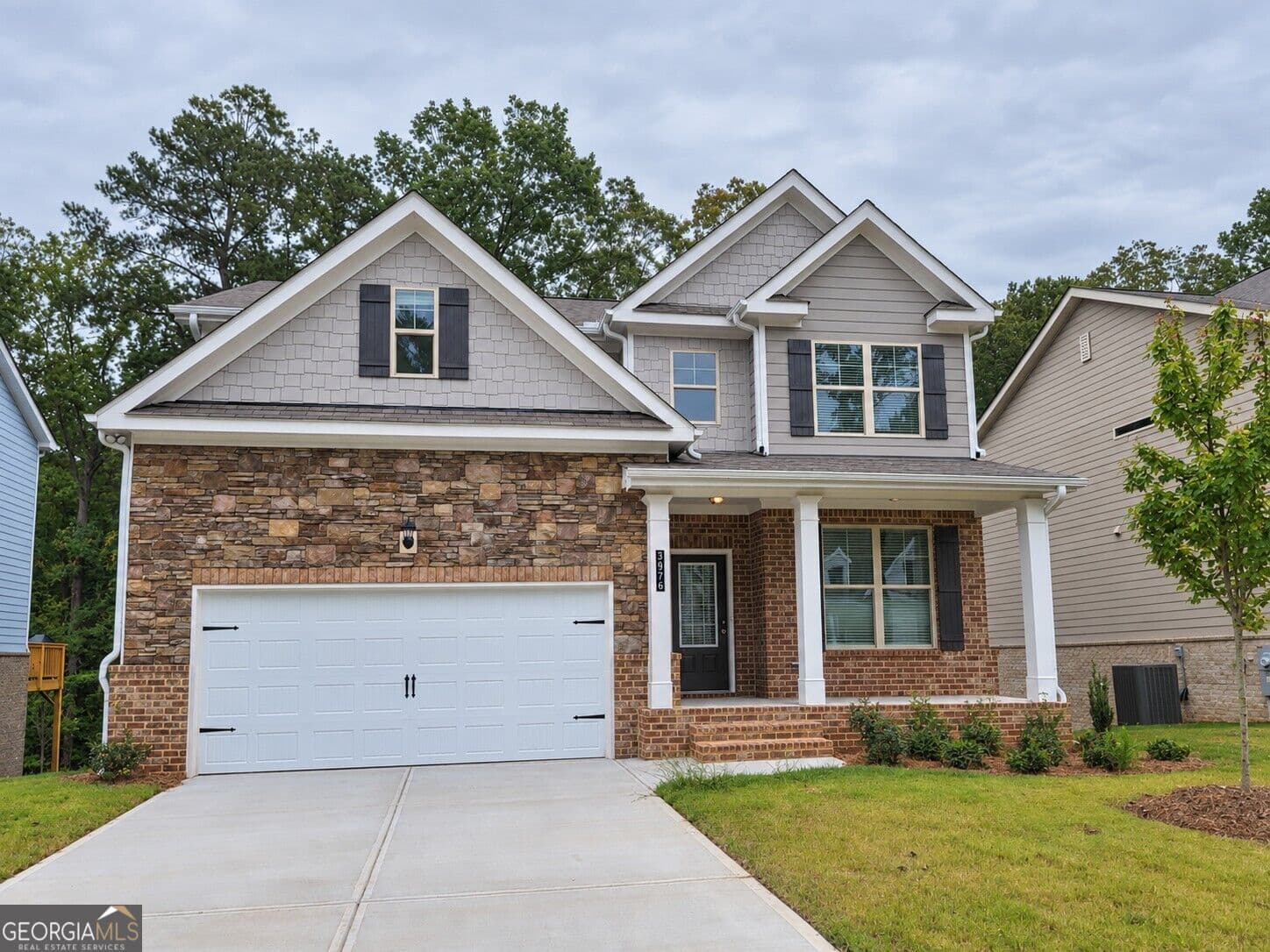 4 bedroom, 2.5 bathroom, 2,428 sq ft single family residence for sale at 3976 Lockaby Way, Lawrenceville, GA 30044 — photo 1 of 28