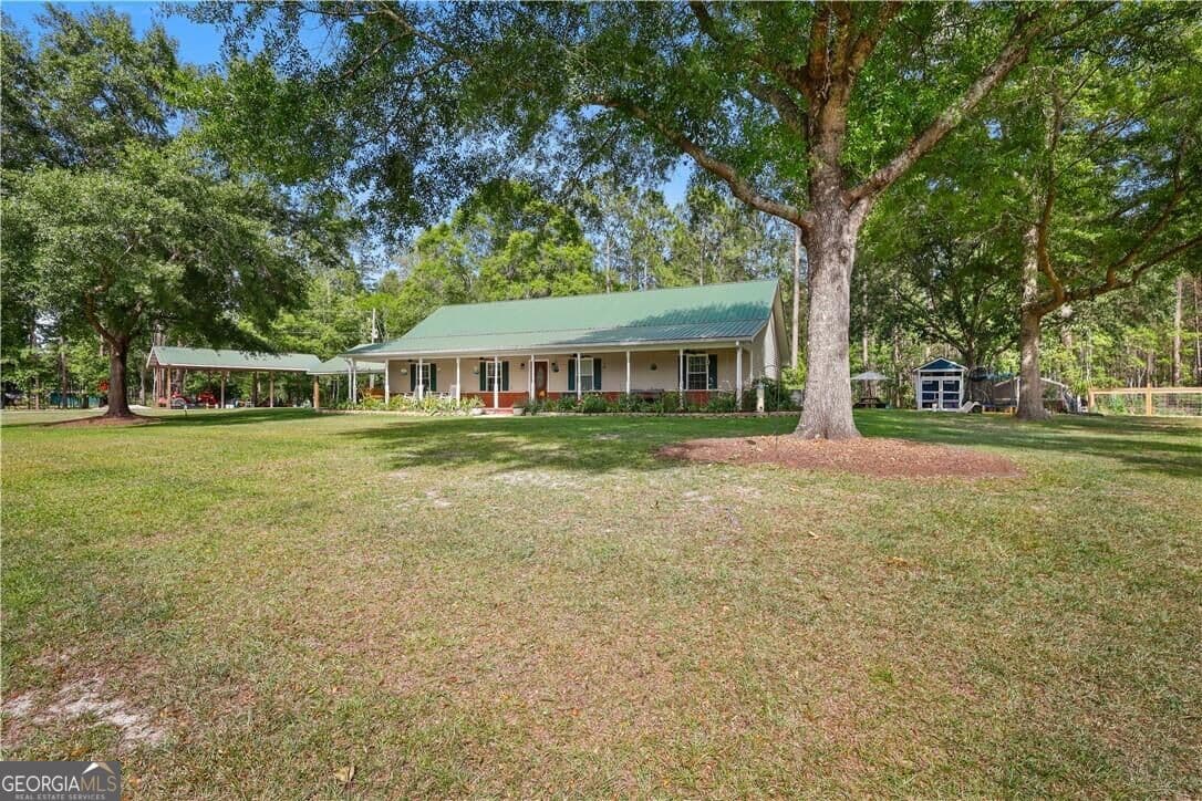 4 bedroom, 2.5 bathroom, 2,508 sq ft single family residence for sale at 3158 Midland Road, Guyton, GA 31312 — photo 2