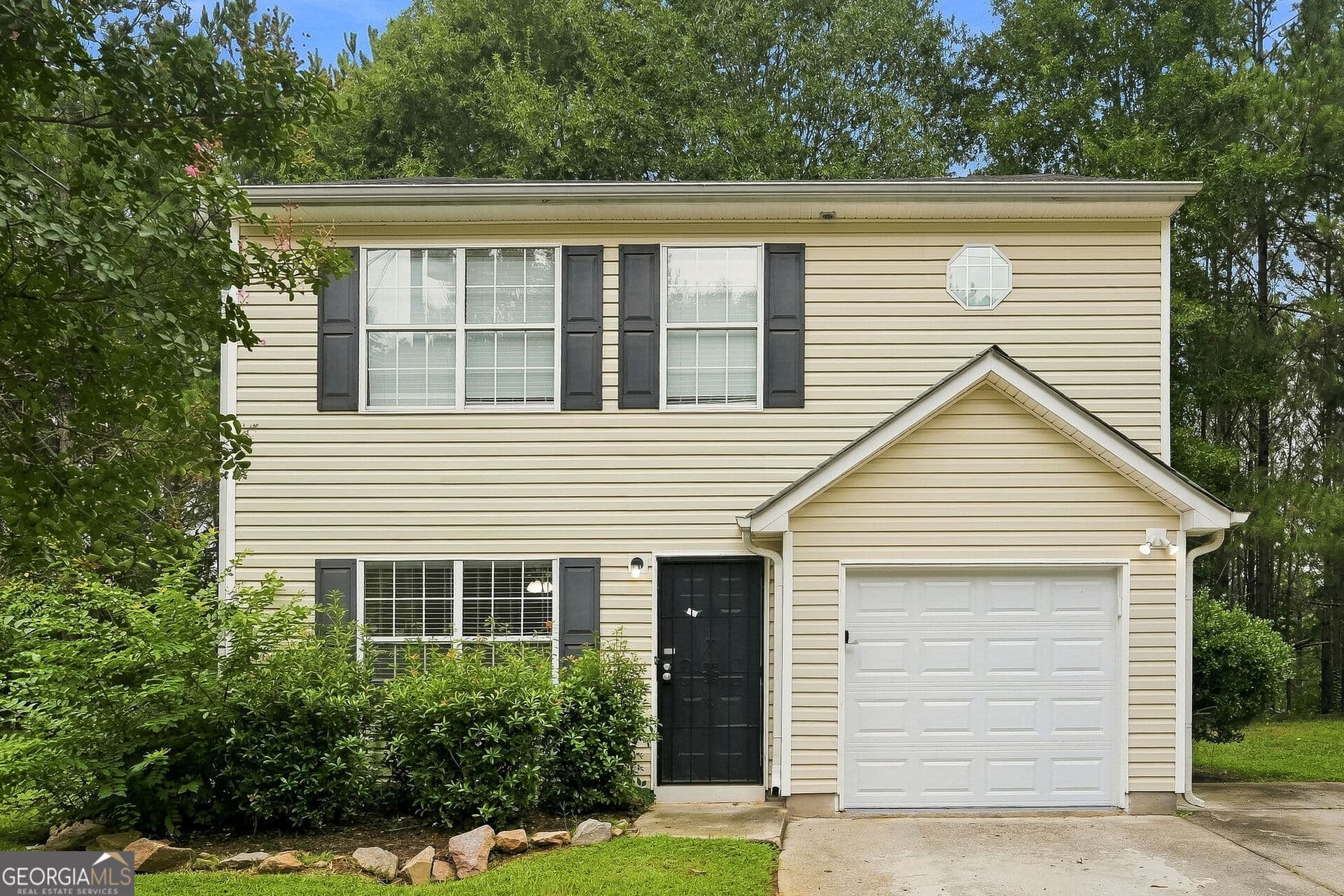 3 bedroom, 2.5 bathroom, 1,508 sq ft single family residence for sale at 7060 Ravenwood Lane, Lithonia, GA 30038 — photo 1 of 22
