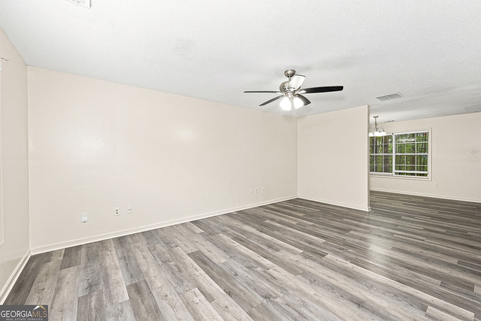 3 bedroom, 2.5 bathroom, 1,508 sq ft single family residence for sale at 7060 Ravenwood Lane, Lithonia, GA 30038 — photo 4