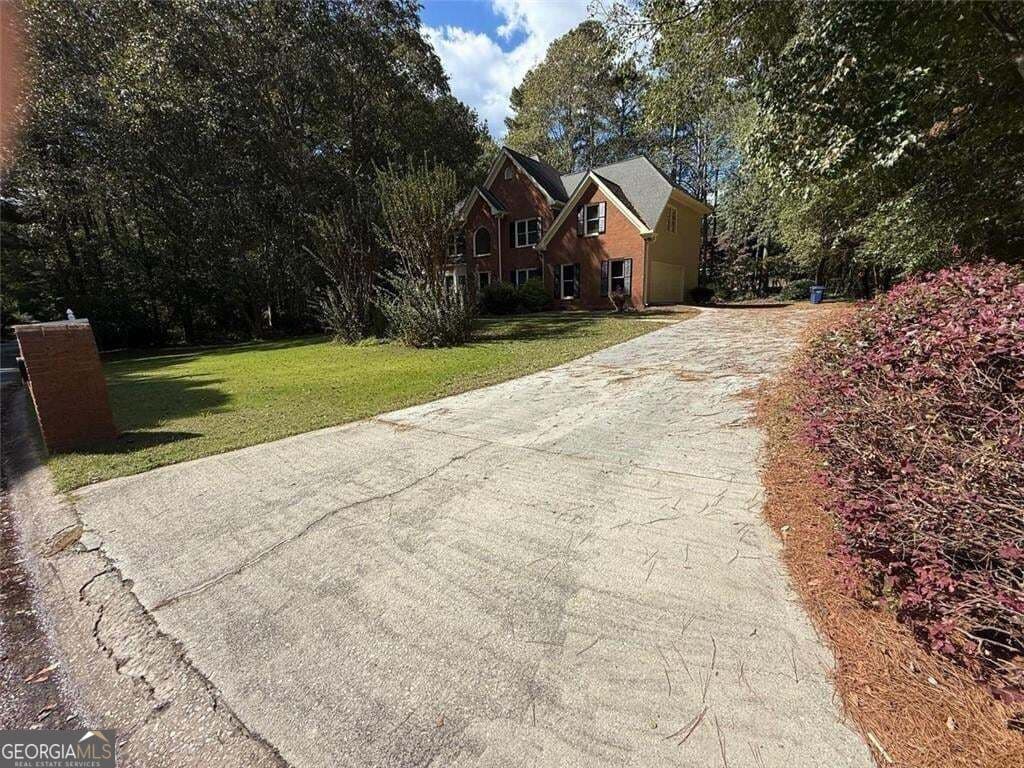 6 bedroom, 3.5 bathroom, 4,146 sq ft single family residence for sale at 2781 Jen Chris Drive, Snellville, GA 30039 — photo 2