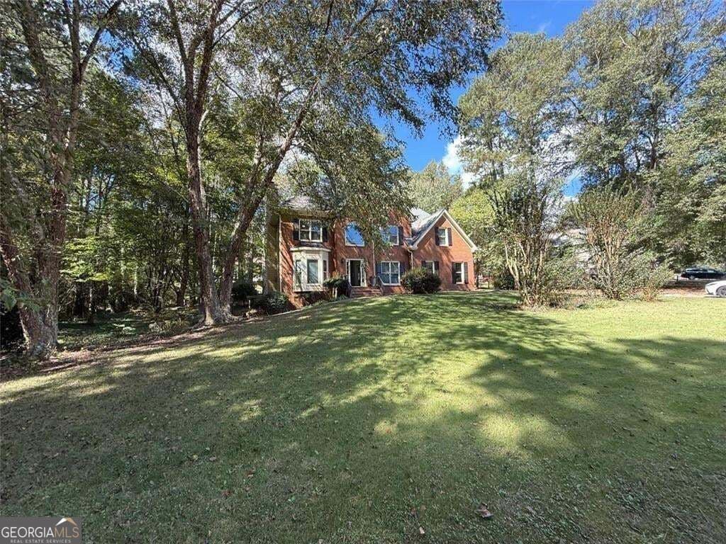 6 bedroom, 3.5 bathroom, 4,146 sq ft single family residence for sale at 2781 Jen Chris Drive, Snellville, GA 30039 — photo 3