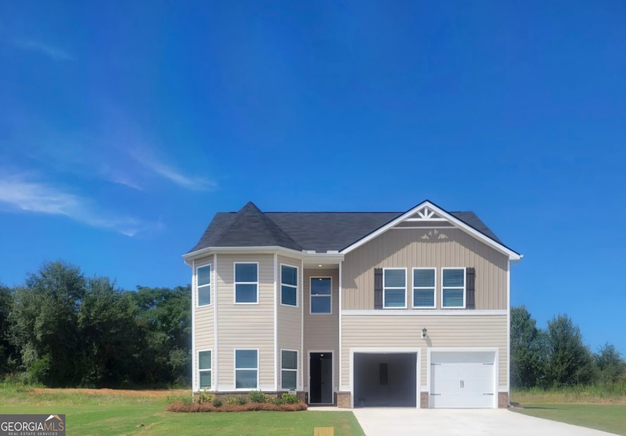 5 bedroom, 3 bathroom, 2,370 sq ft single family residence for sale at 804 Clydes Way, Jackson, GA 30233 — photo 3