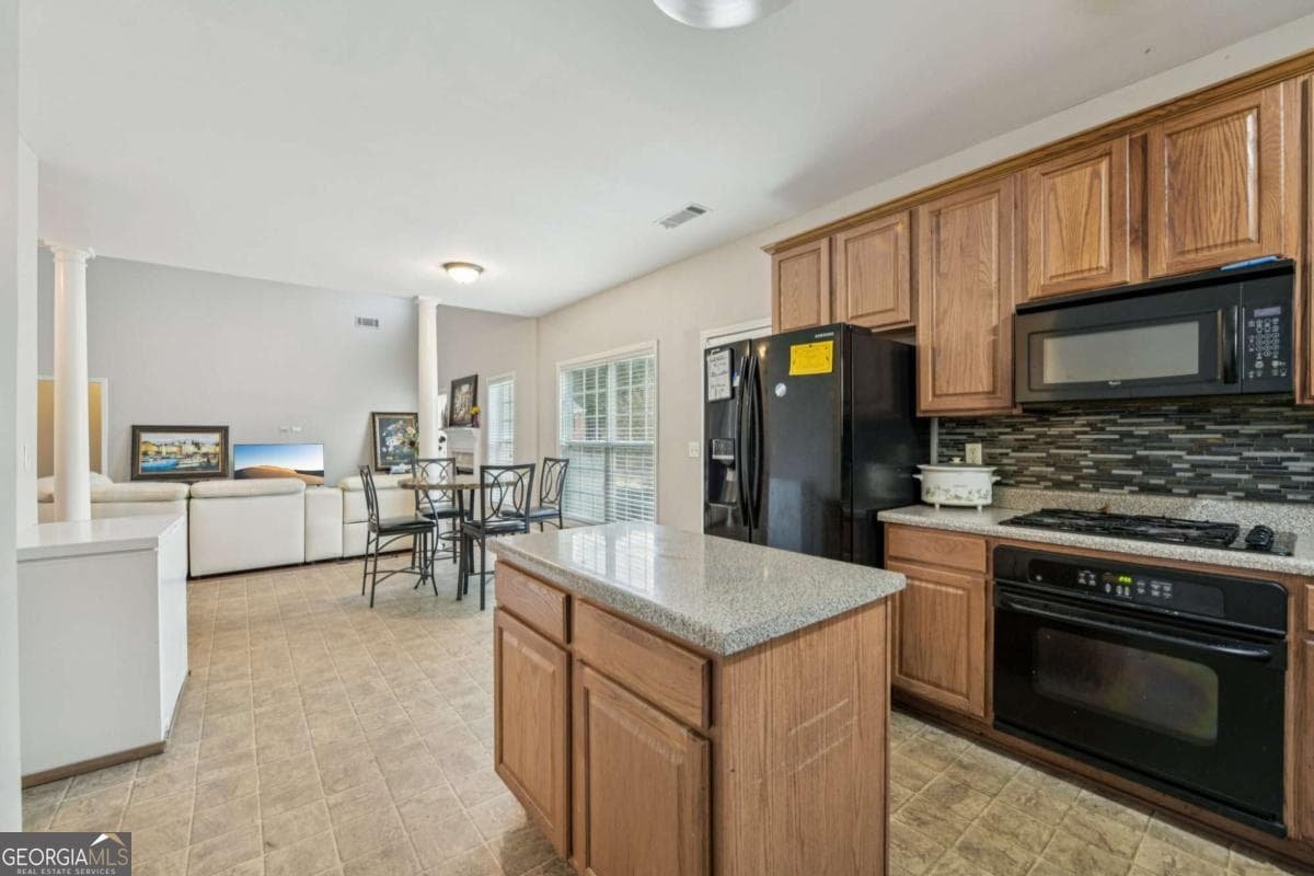 5 bedroom, 2.5 bathroom, 2,896 sq ft single family residence for sale at 2393 Shady Maple Lane, Loganville, GA 30052 — photo 9
