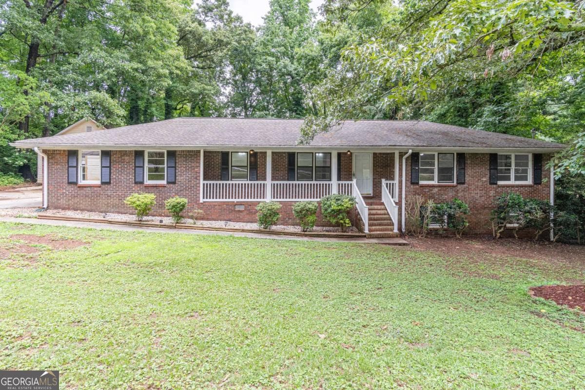 4 bedroom, 2 bathroom, 1,670 sq ft single family residence sold at 5022 Green Oak Drive, Lilburn, GA 30047