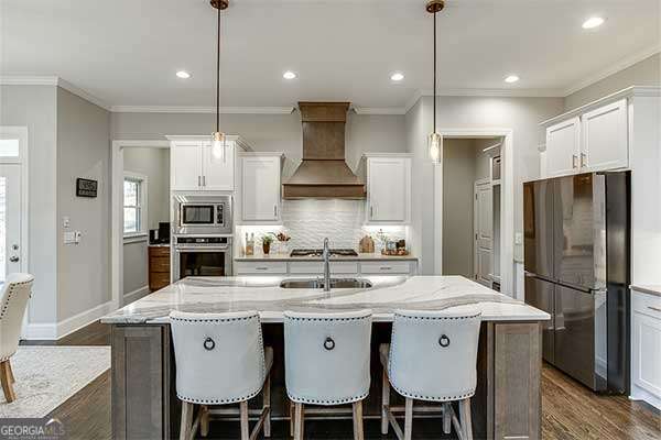4 bedroom, 4.5 bathroom, 3,455 sq ft single family residence for sale at 4610 Blakeford Court, Flowery Branch, GA 30542 — photo 5