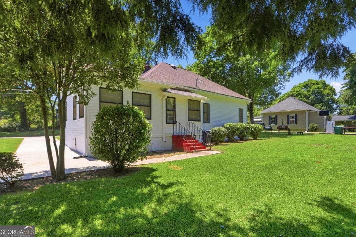 4 bedroom, 1 bathroom, 1,461 sq ft single family residence sold at 10 Woodlawn Avenue, Hampton, GA 30228
