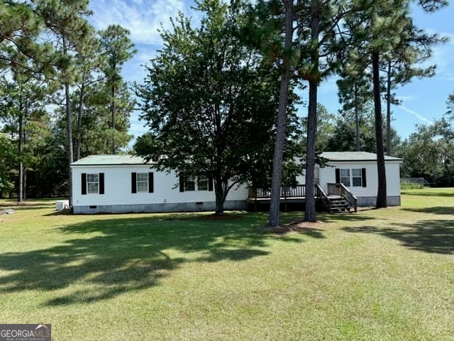4 bedroom, 2 bathroom, 2,432 sq ft manufactured home,single family residence sold at 6000 Old Pence Farm Road, Metter, GA 30439