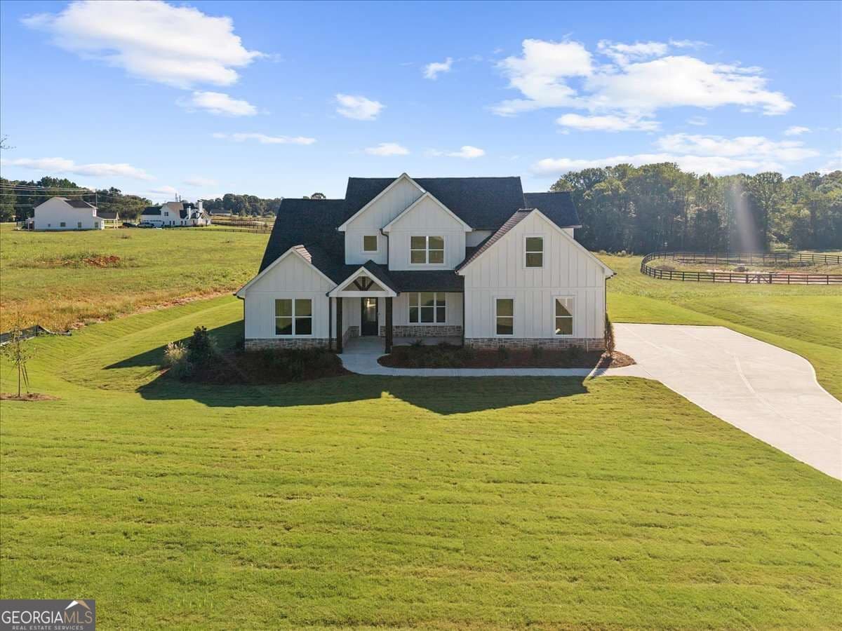 4 bedroom, 2.5 bathroom single family residence for sale at 5335 Noah Road, Cumming, GA 30041 — photo 3