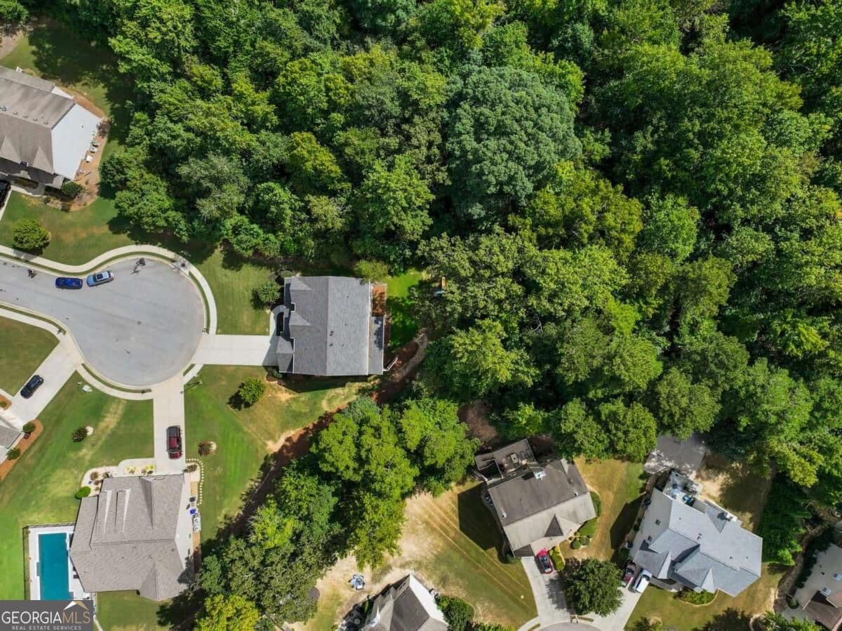 4 bedroom, 3.5 bathroom, 3,257 sq ft single family residence for sale at 3930 Ivy Lawn Court, Buford, GA 30519 — photo 4