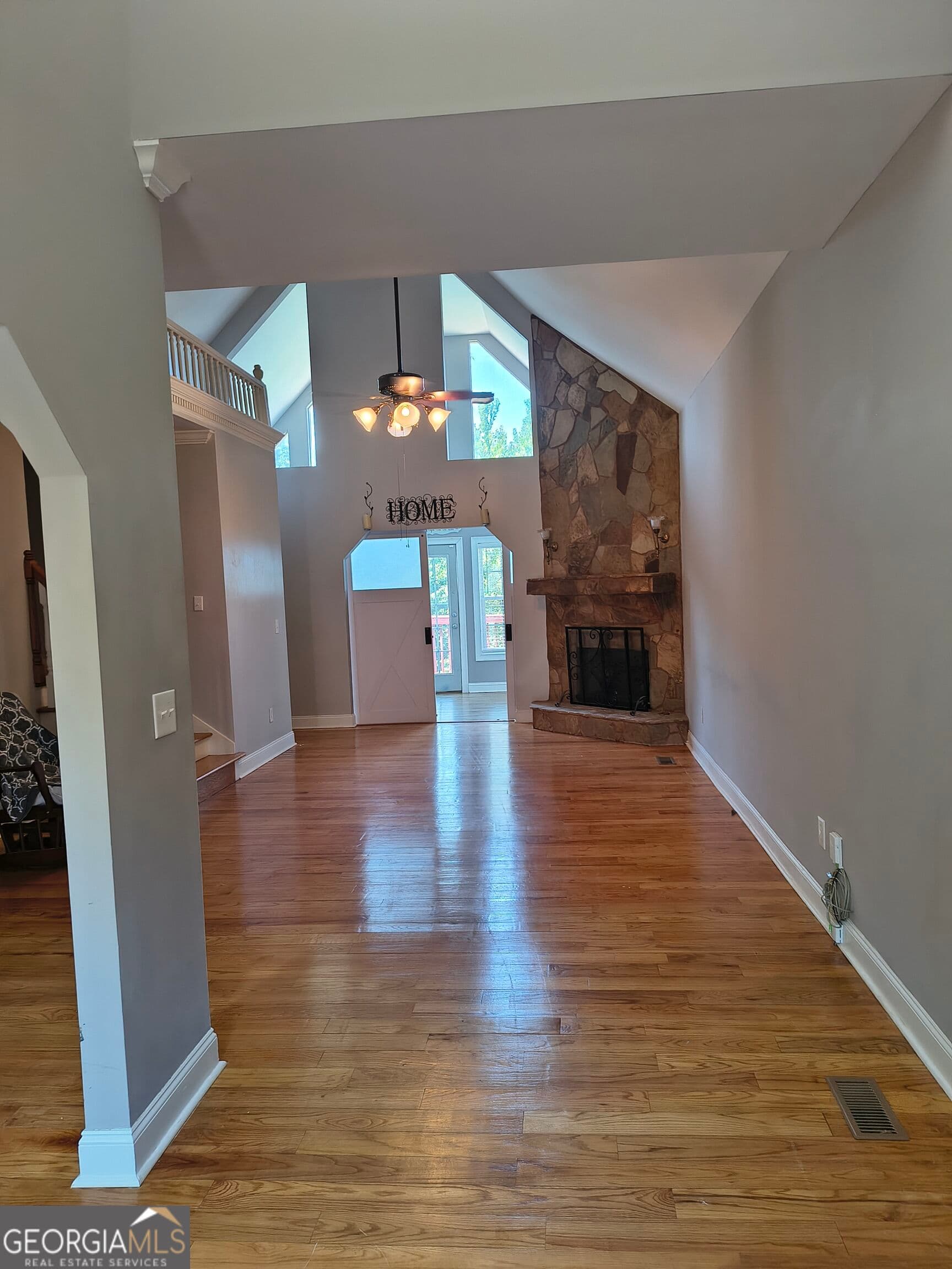 7 bedroom, 5.5 bathroom, 6,213 sq ft single family residence for sale at 2328 E Gwendale Drive, Lizella, GA 31052 — photo 2