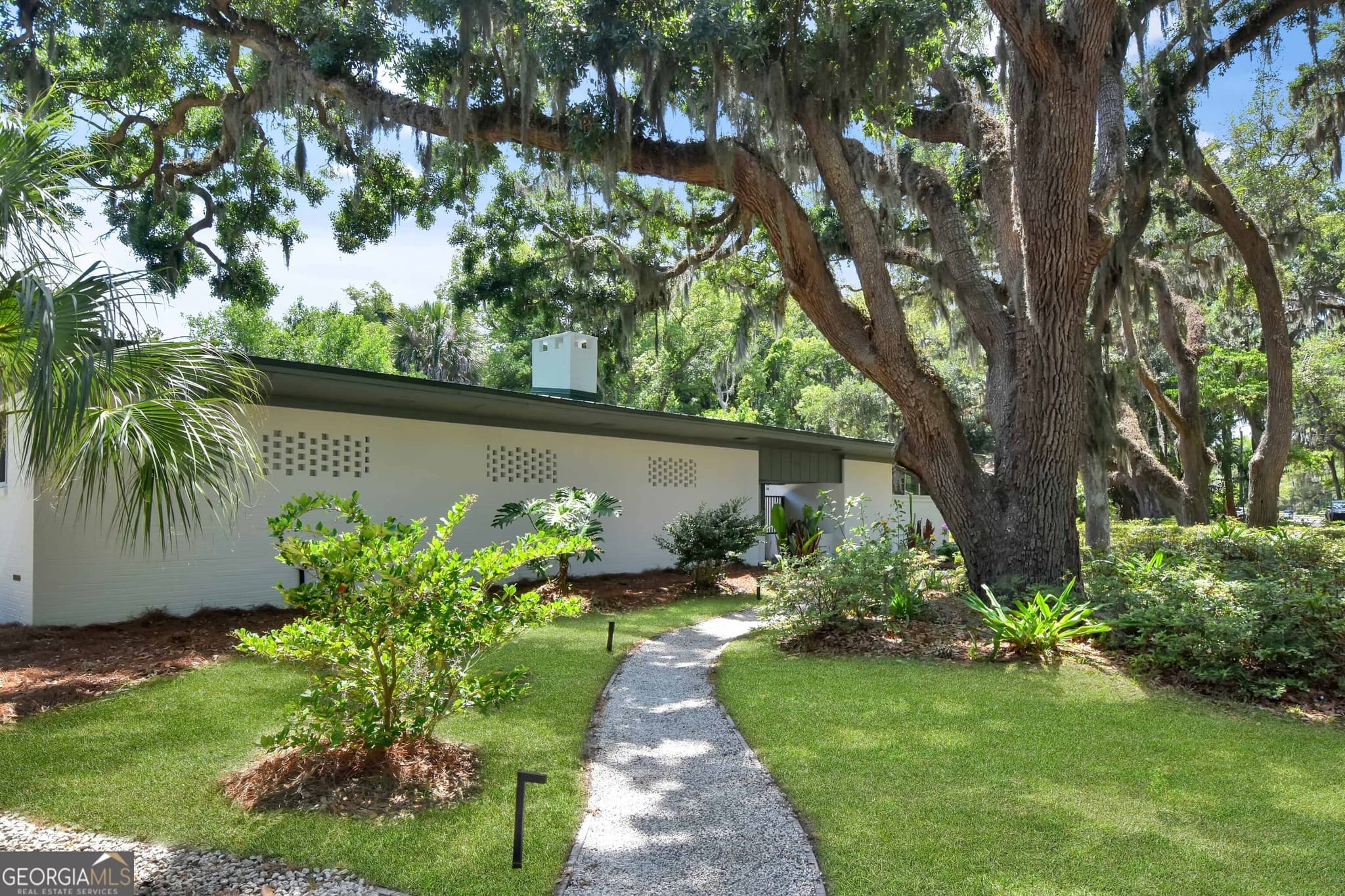4 bedroom, 3 bathroom, 2,477 sq ft single family residence for sale at 101 Druid Oaks Lane, St. Simons, GA 31522